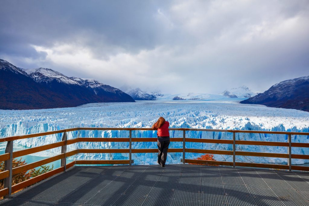 tourist-near-perito-moreno-glacier-argentina-perito-moreno-is-glacier-located-los-glaciares-national-park-argentinian-patagonia-scaled.jpg